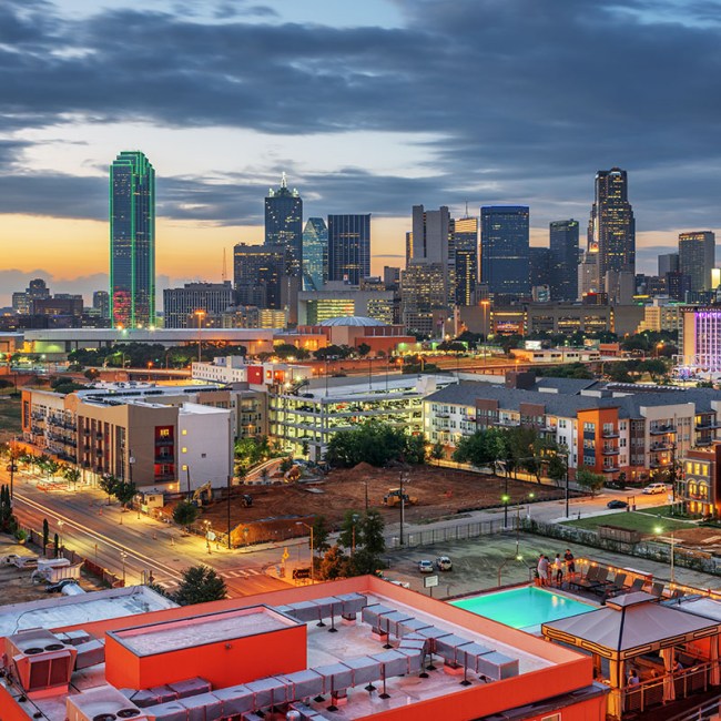 Dallas, Texas, USA downtown city skyline at dusk.